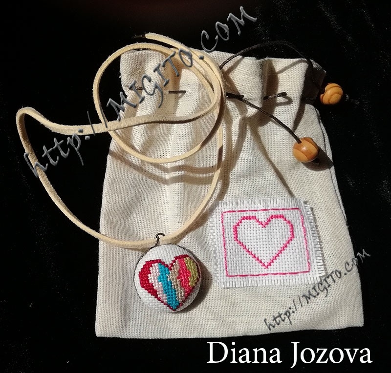 Hand embroidered necklace with heart